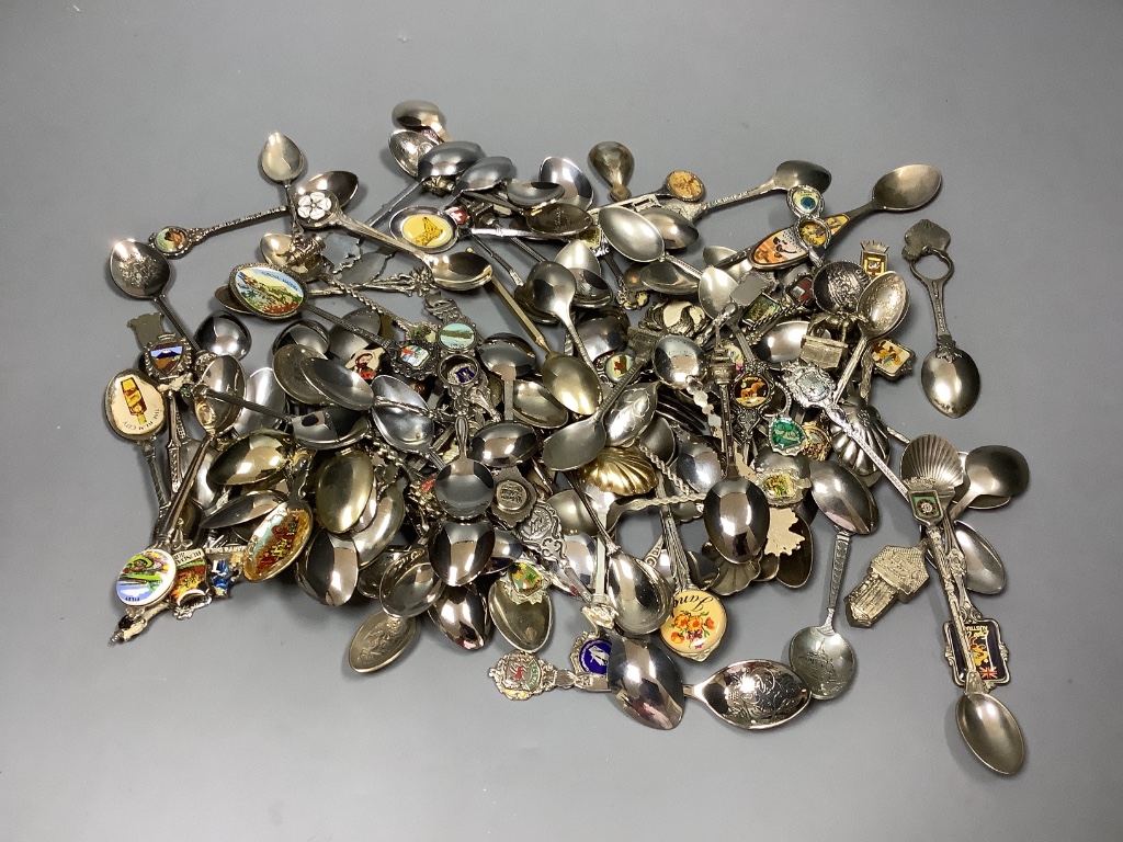 A collection of plated souvenir spoons